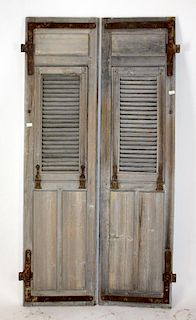 Pair of French weathered wood doors with shutters