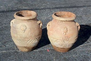 Pair of terra cotta olive oil jug style planters.