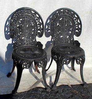 Pair of  wrought iron garden chairs