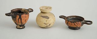 TWO APULIAN RED-OWL FIGURES, A SMALL TWO-HANDLED VESSEL, AND AN ATTIC BUFF-GROUND SPHERICAL JAR