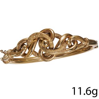 ANTIQUE GOLD SCROLL KNOT HINGED BANGLE.