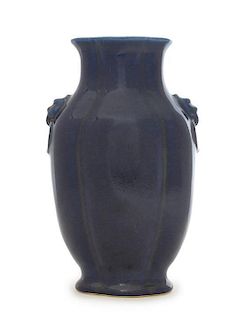 A Blue Glazed Porcelain Baluster Vase Height 10 3/4 inches.