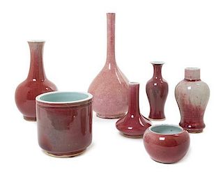 Seven Copper Red Glazed Porcelain Articles Height of tallest 9 3/4 inches.