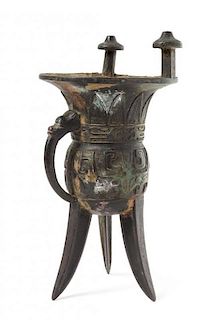 A Bronze Archaistic Vessel, "Jia" Height 11 1/4 inches.