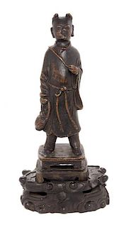 A Bronze Figure of a Young Buddhist Monk Height 5 1/2 inches.