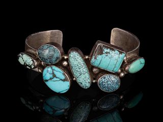 BOBBY JOHNSON (NAVAJO, B. 1952) NATIVE AMERICAN STERLING SILVER AND TURQUOISE CUFF BRACELET