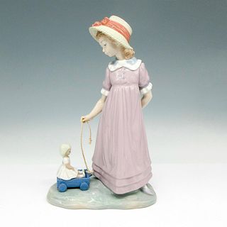 Girl With Toy Wagon 1005044 - Lladro Porcelain Figurine