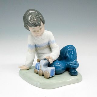 Boy with Train - Nao by Lladro Porcelain Figurine