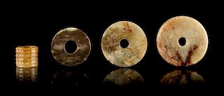 Four Archaistic Jade Articles Diameter of largest 2 5/8 inches.