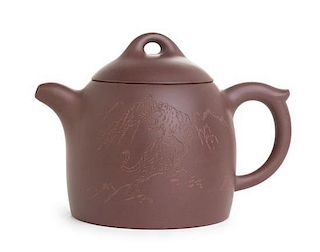 A Yixing Pottery Teapot Height 3 7/8 inches.