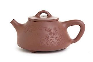 A Yixing Pottery Teapot Height 2 7/8 inches.