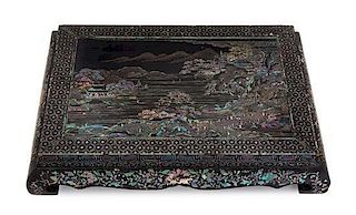 A Mother-of-Pearl Inlaid Lacquer Stand Length 18 3/4 x width 14 inches.