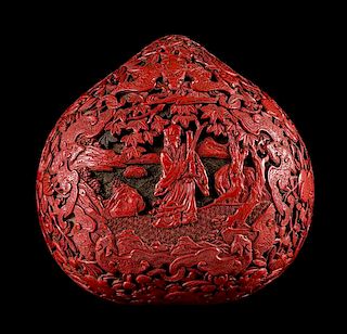A Cinnabar Lacquered Peach-Form Covered Box Width 6 inches.