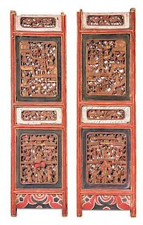 A Pair of Carved Wood Panels Height 53 3/4 x width of each panel 15 3/4 inches.