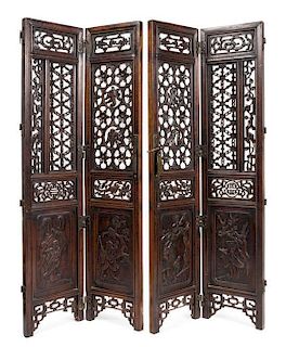 A Carved Wood Four-Panel Screen Height of each panel 41 1/2 x width 9 inches.
