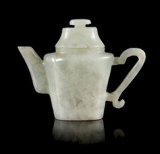 A Small Jadeite Teapot Height 3 inches.