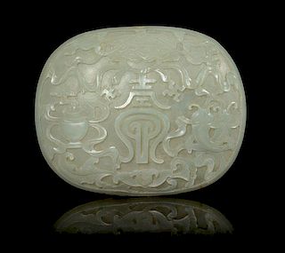 A Celadon Jade Oval Plaque Length 3 3/4 inches.