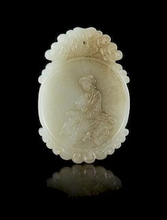 A White Jade Oval Plaque Length 2 1/4 inches.