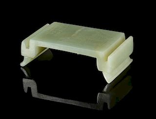 A Carved Celadon Jade Brush Stand Length 3 inches.