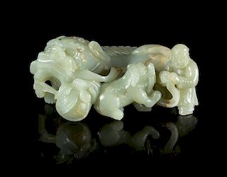 A Carved Celadon Jade Figural Group Length 7 1/2 inches.