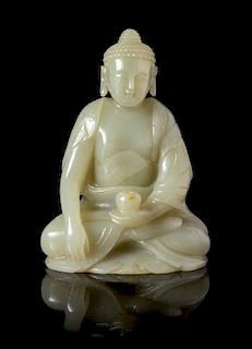 A Carved Pale Celadon Jade Figure of Buddha Height 4 3/4 inches.