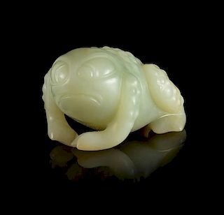 A Carved Celadon Figure of a Toad Length 2 inches.