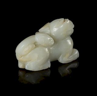 A Carved Jade Figure of a Mythical Beast Length 2 1/4 inches.