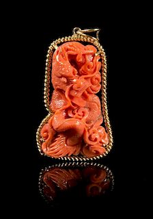 A Carved Coral Pendant Height 2 inches.