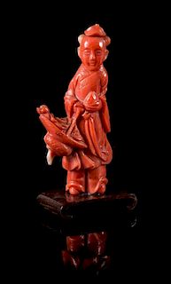 A Small Coral Figure of an Immortal Height 3 inches.