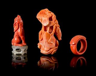 Three Carved Red Coral Articles Height of largest 2 inches.