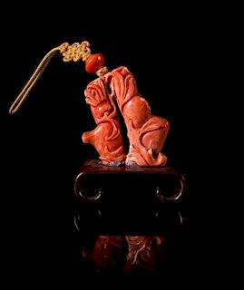 A Small Red Coral Carving Height 2 inches.