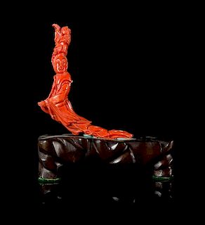 * A Carved Red Coral Figure of a Female Immortal Height 4 1/4 inches.