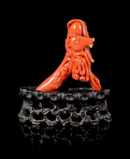 A Small Red Coral Carving Length 2 1/4 inches.