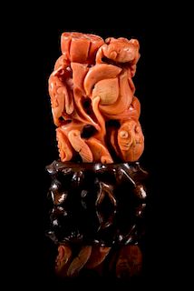 A Small Pink Coral Carving Height 2 3/4 inches.