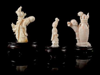 * Three Carved White Coral Figures Height of tallest 3 3/4 inches.