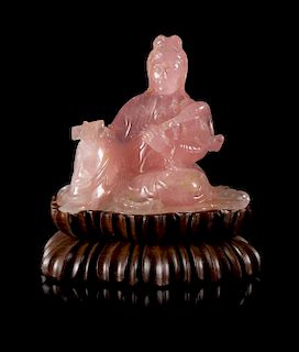 A Carved Rose Quartz Figure of Guanyin Height 3 1/4 inches.