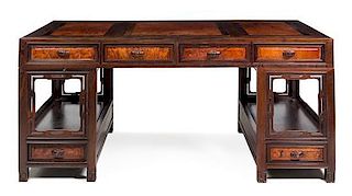 A Chinese Mixed Wood Partner's Desk Height 32 1/4 x length 72 1/4 x width 32 3/4 inches.