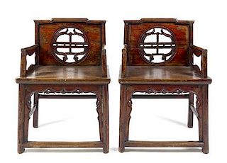 A Pair of Chinese Nanmu Wood Chairs Height 33 1/2 inches.