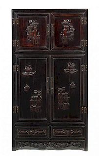 A Chinese Carved Hardwood Cabinet Height 28 x width 15 x depth 7 3/4 inches.
