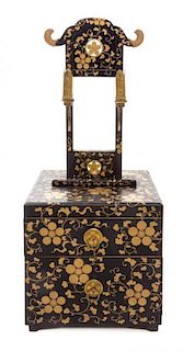 A Japanese Gilt and Black Lacquer Mirror Stand Height 25 1/2 x width 10 3/4 x depth 10 7/8 inches.