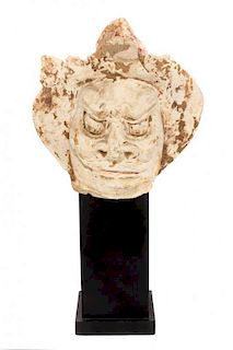 A Chinese Painted Pottery Head of a Guardian Height 5 1/2 inches.