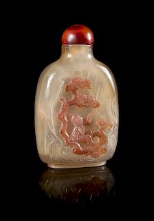 A Carved Agate Snuff Bottle Height 3 1/8 inches.