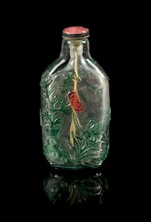 A Green Overlay Peking Glass Snuff Bottle Height 2 5/8 inches.
