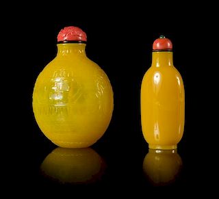 Two Yellow Peking Glass Snuff Bottles Height of larger 3 1/4 inches.