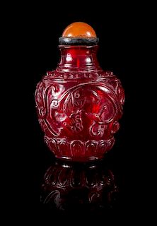A Ruby Red Peking Glass Snuff Bottle Height 2 3/8 inches.