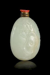 A Carved White Jade Snuff Bottle Height 2 1/4 inches.