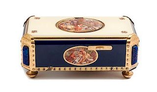 A Swiss Gilt Bronze and Enamel Music Box Length 4 7/8 inches.