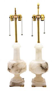 A Pair of Carved Alabaster Table Lamps Height overall 33 inches.