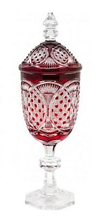 A Ruby-Cut-to-Clear Glass Covered Urn Height 15 1/2 inches.