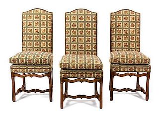 A Set of Eight Italian Walnut Dining Chairs Height 43 x width 19 x depth 21 inches.